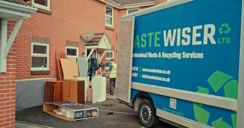 Waste Wiser home services team removing rubbish from a customer's house